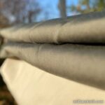 Koyu yeşil renk mont astarı kaygan parlak toptan parça kumaş ürün ana görseli