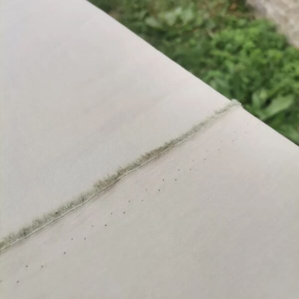 Likralı astarlık paraşüt parça kumaş fildişi rengi haki gri yakın çekim ürün fotoğrafı Atilla Tekstil