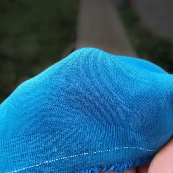 Mavi renk (Blue Color) terikoton gabardin likralı parça kumaş ürünü toptan satın alıp fiyatları öğrenmek için kısayol görseli / Yakın çekim fotoğraf