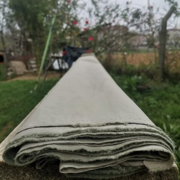 Streç likralı elestan astarlık paraşüt kumaş montluk fildişi rengi parça fiyatları içeren ürün görseli