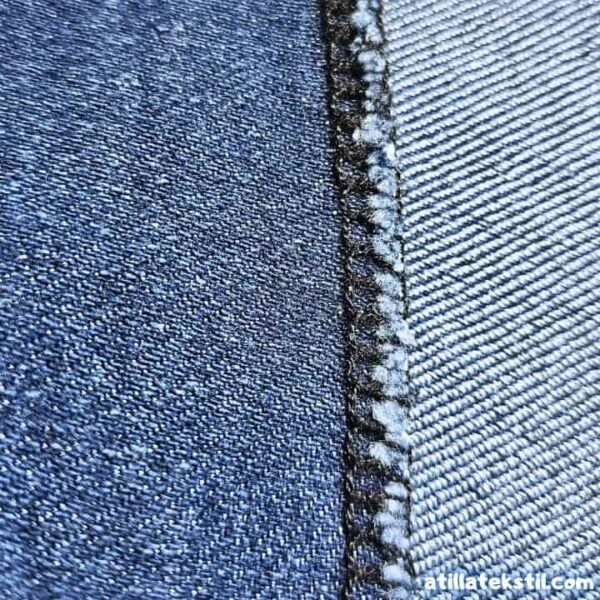Yakın çekim parça denim kumaş yıkanmış uygun fiyatları ve satın alma seçenekleri ile Atilla Tekstil'de ürün görseli içeriği
